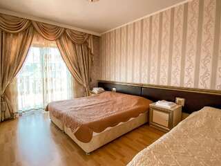 Гостиница Holiday Лазаревское Люкс с 2 спальнями-11
